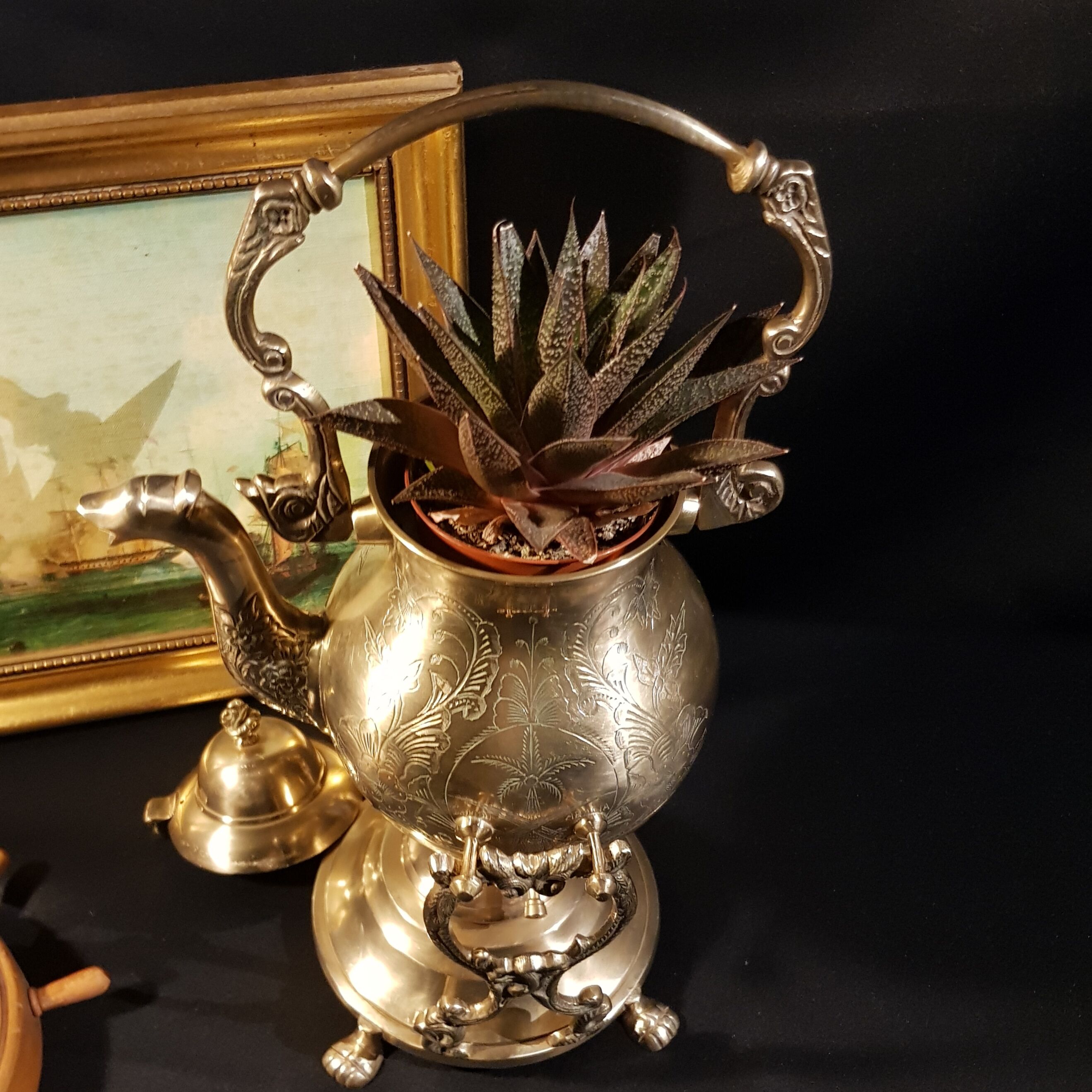 Oriental teapot on its support