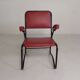 Set of 4 armchairs and a coffee table with tubular structure in Bauhaus style, 1950s.