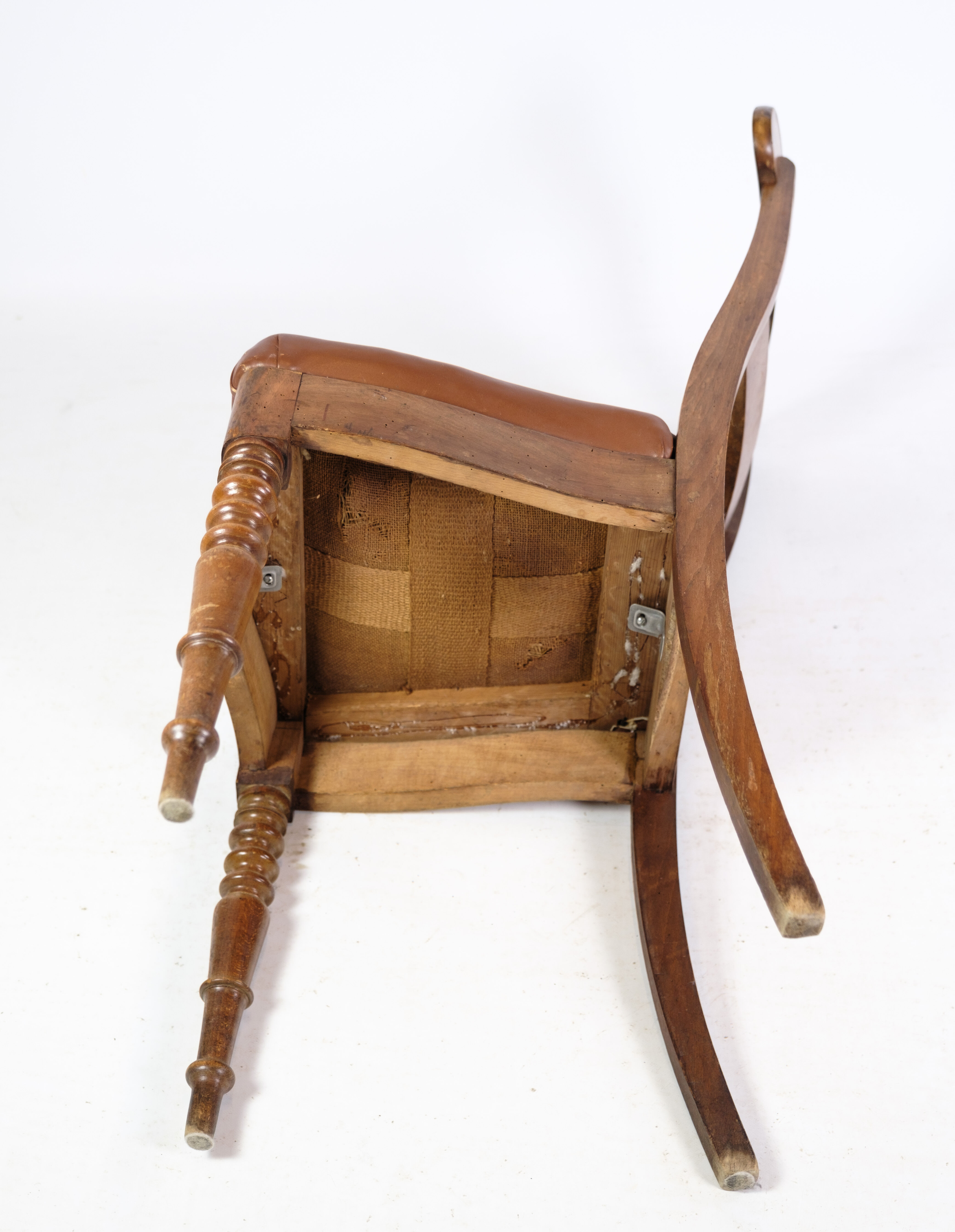 Set of eight late empire chairs in high quality brown leather in mahogany