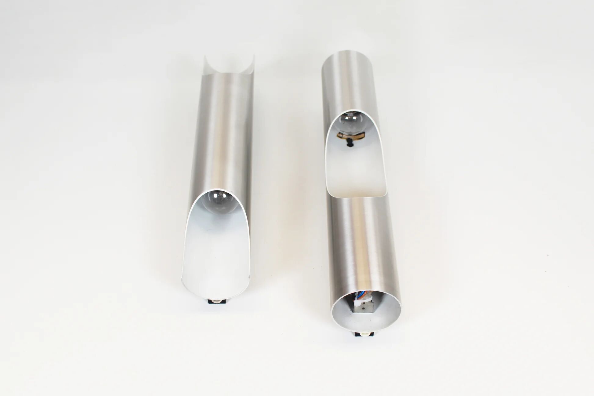 Pair of 70s 'fuga' wall lamps by raak