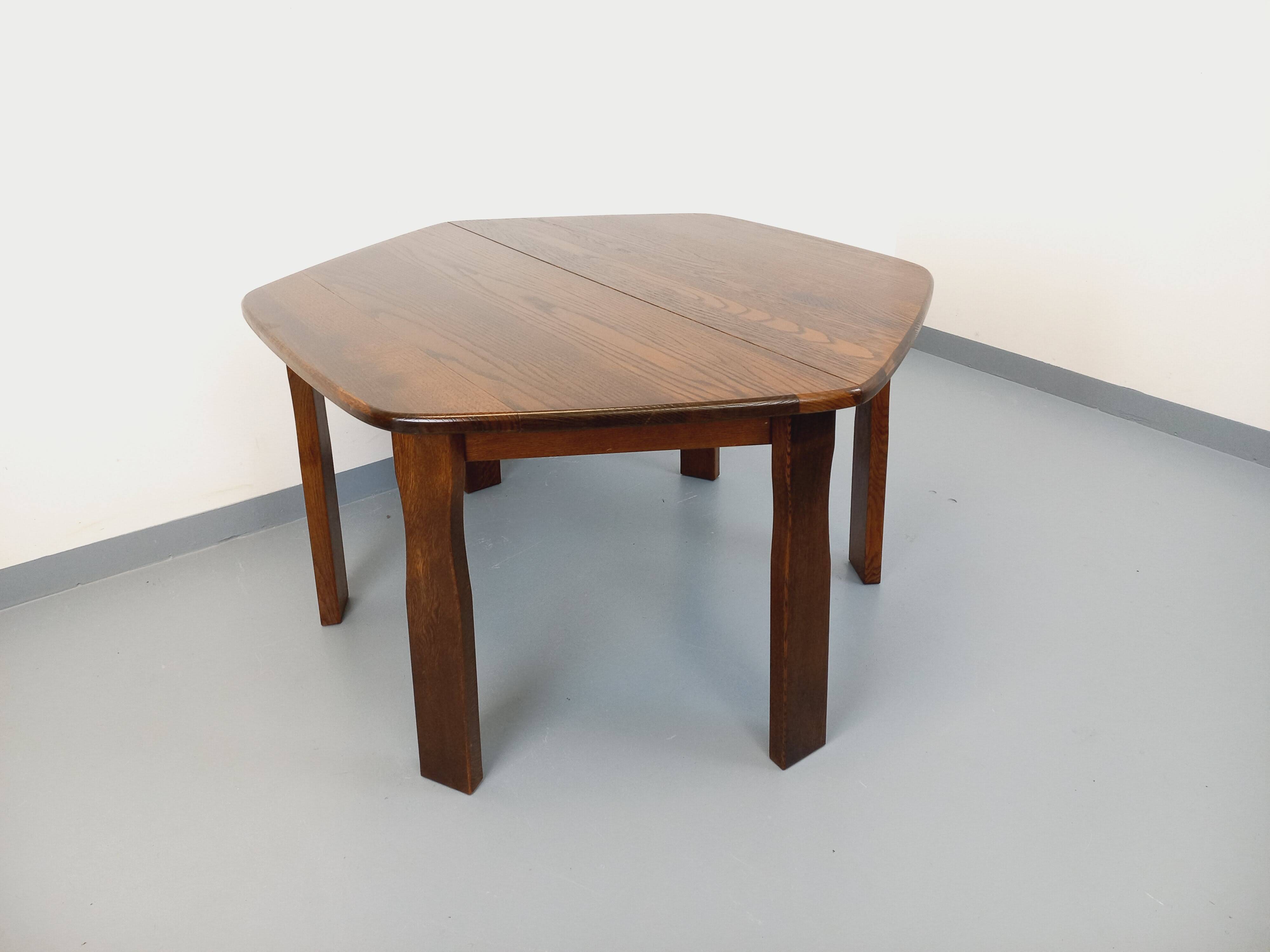 Vintage brutalist hexagonal dining table made of oak from the 1950s.