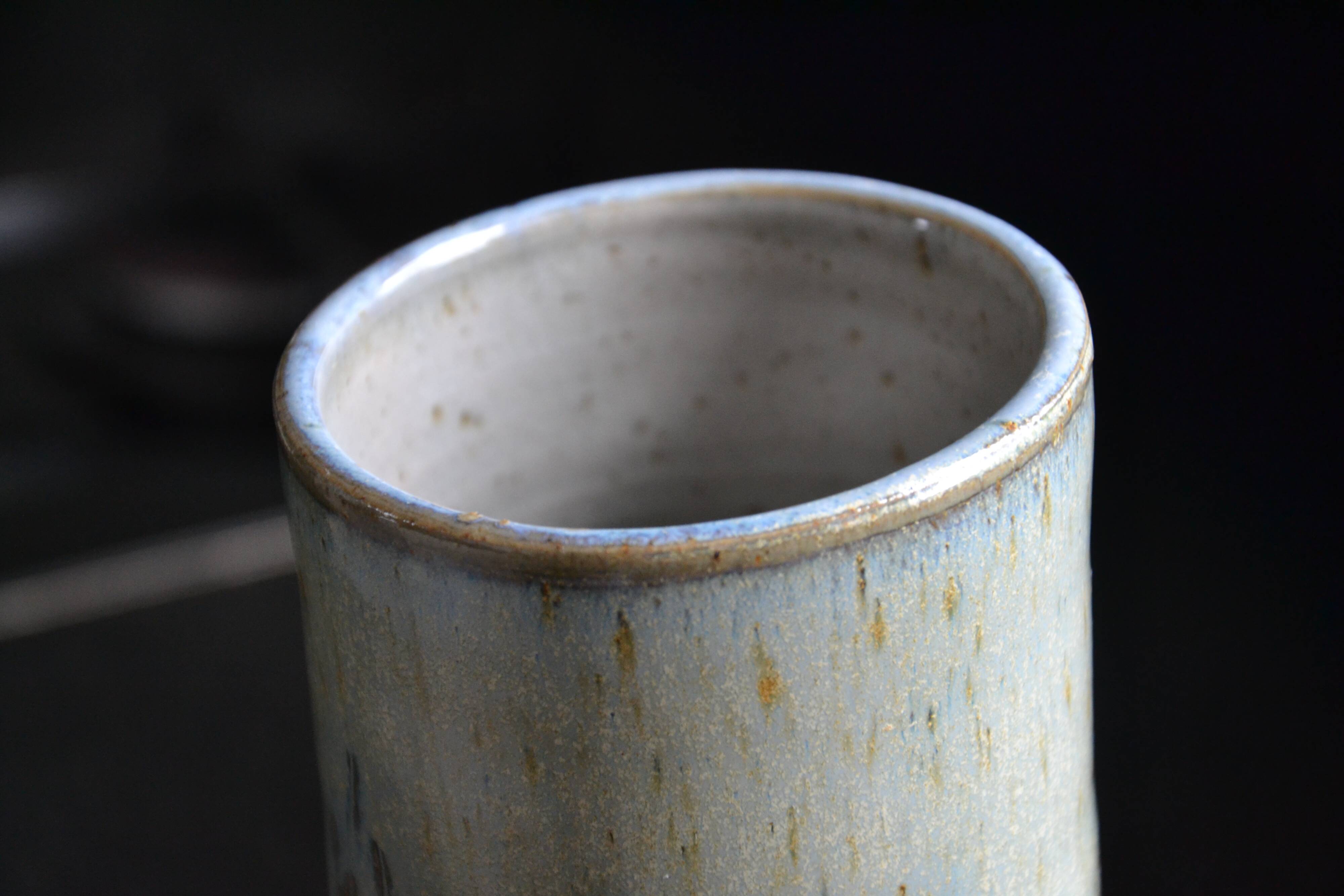 Signed chiseled and glazed stoneware roller/tube vase