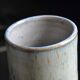Signed chiseled and glazed stoneware roller/tube vase