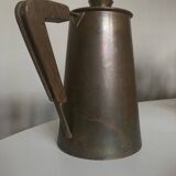 Modernist Italian pitcher design from the 1960s in patinated wood and metal.