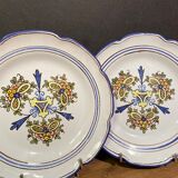 Pair of Nevers earthenware plates signed Georges