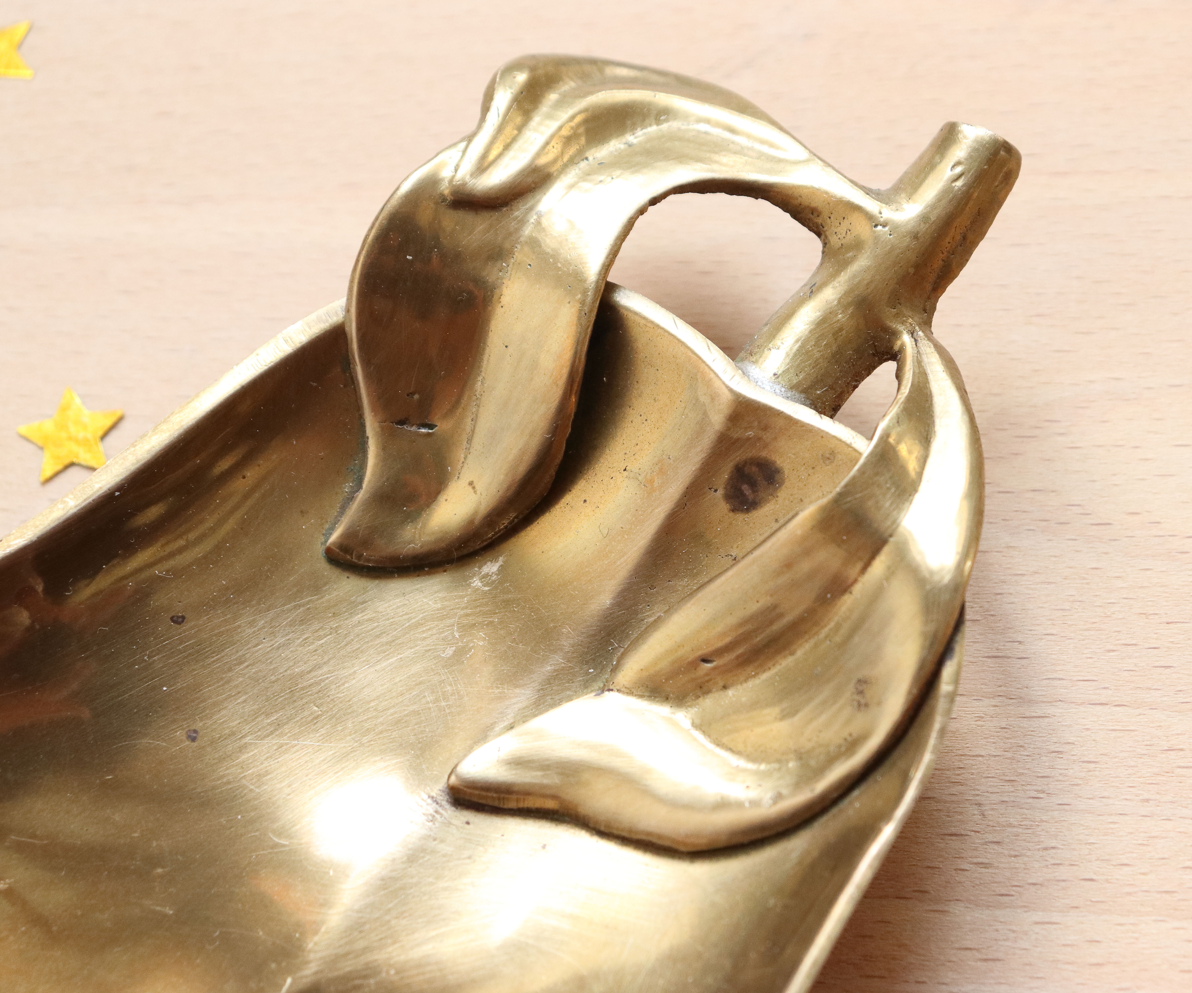 1960s gold-plated brass pear-shaped pocket emptier