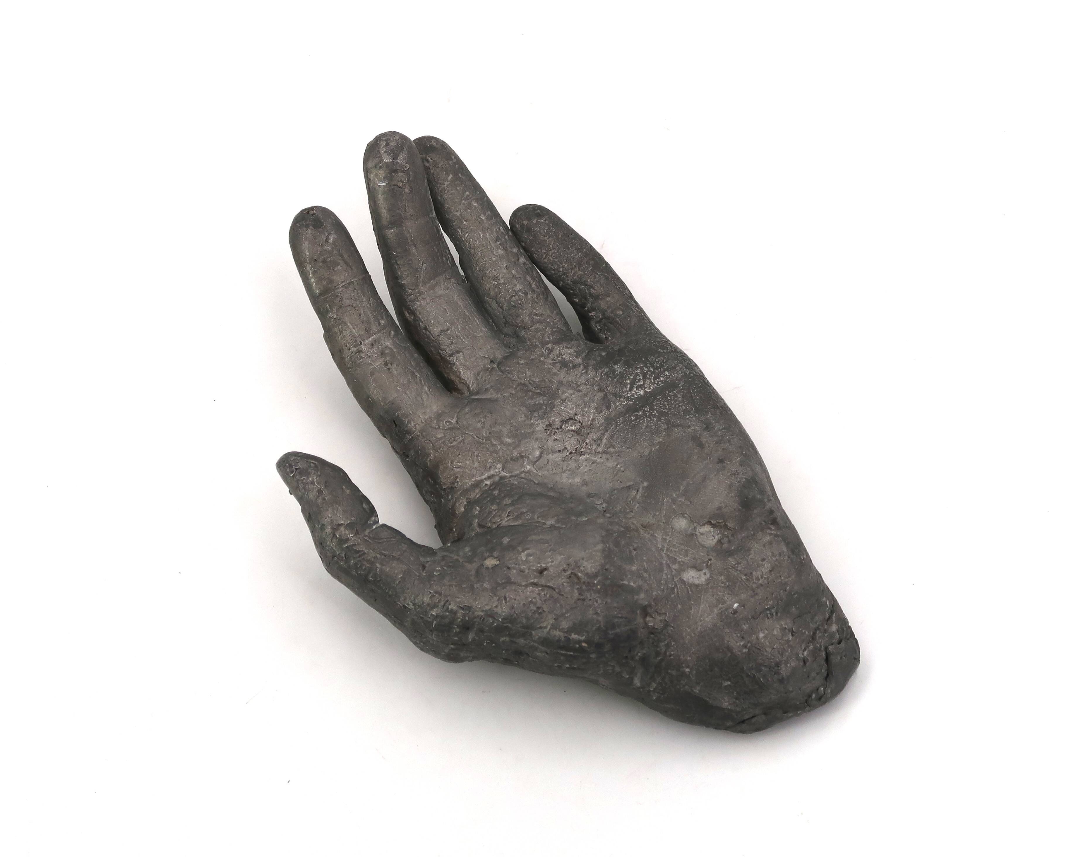 Cast iron silver-coloured catchall in the shape of a hand, 1970s sculpture.
