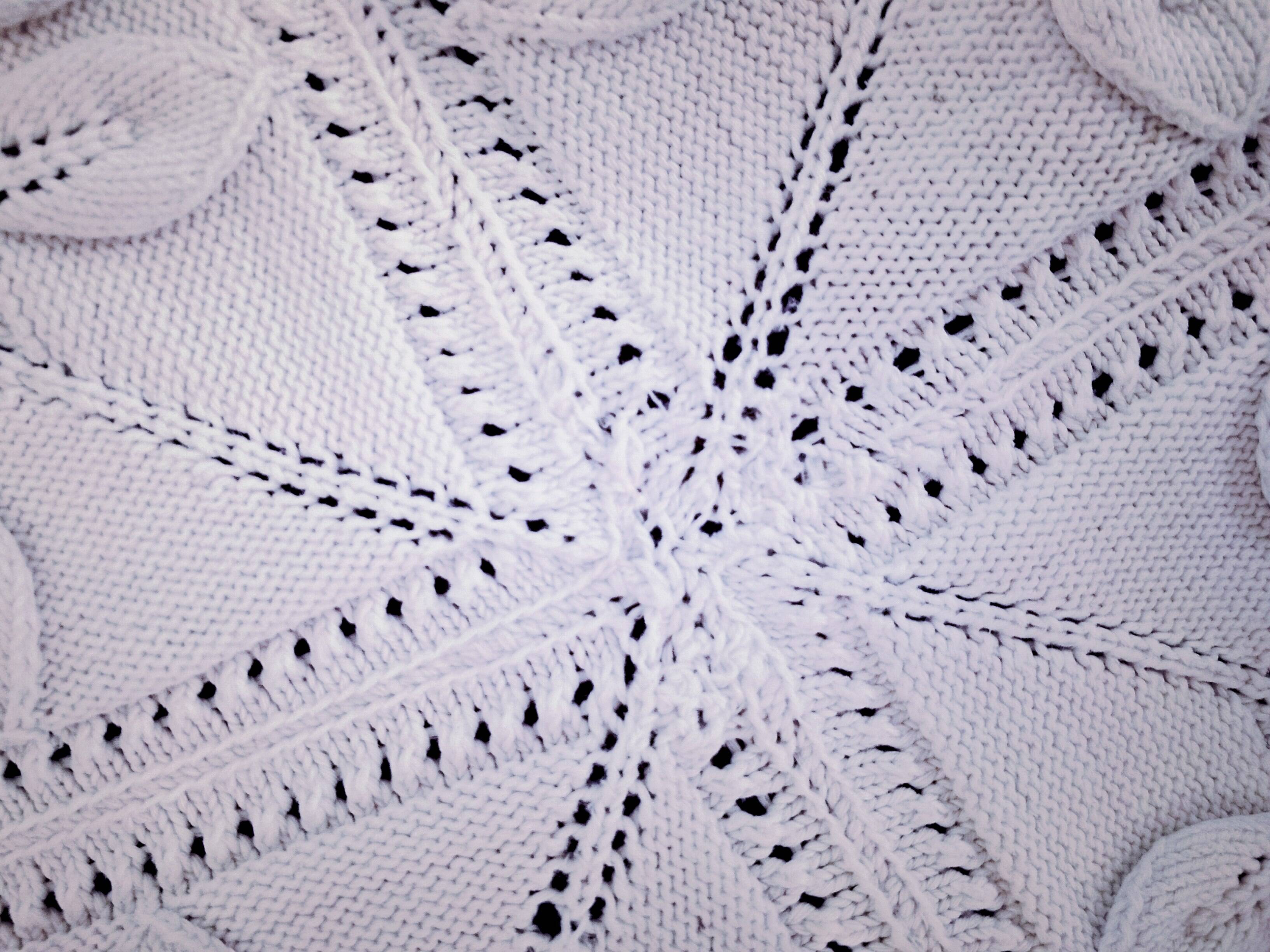 Knitted white cotton bedspread