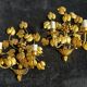 Stunning vintage wall lights in gilded iron with vine and grape decor from Italy.