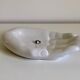Empty white enamelled ceramic pocket in the shape of a large hand, 1990