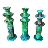 Trio of Tamegroute candlestick holders in enamelled ceramic.