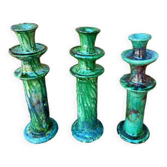 Trio of Tamegroute candlestick holders in enamelled ceramic.