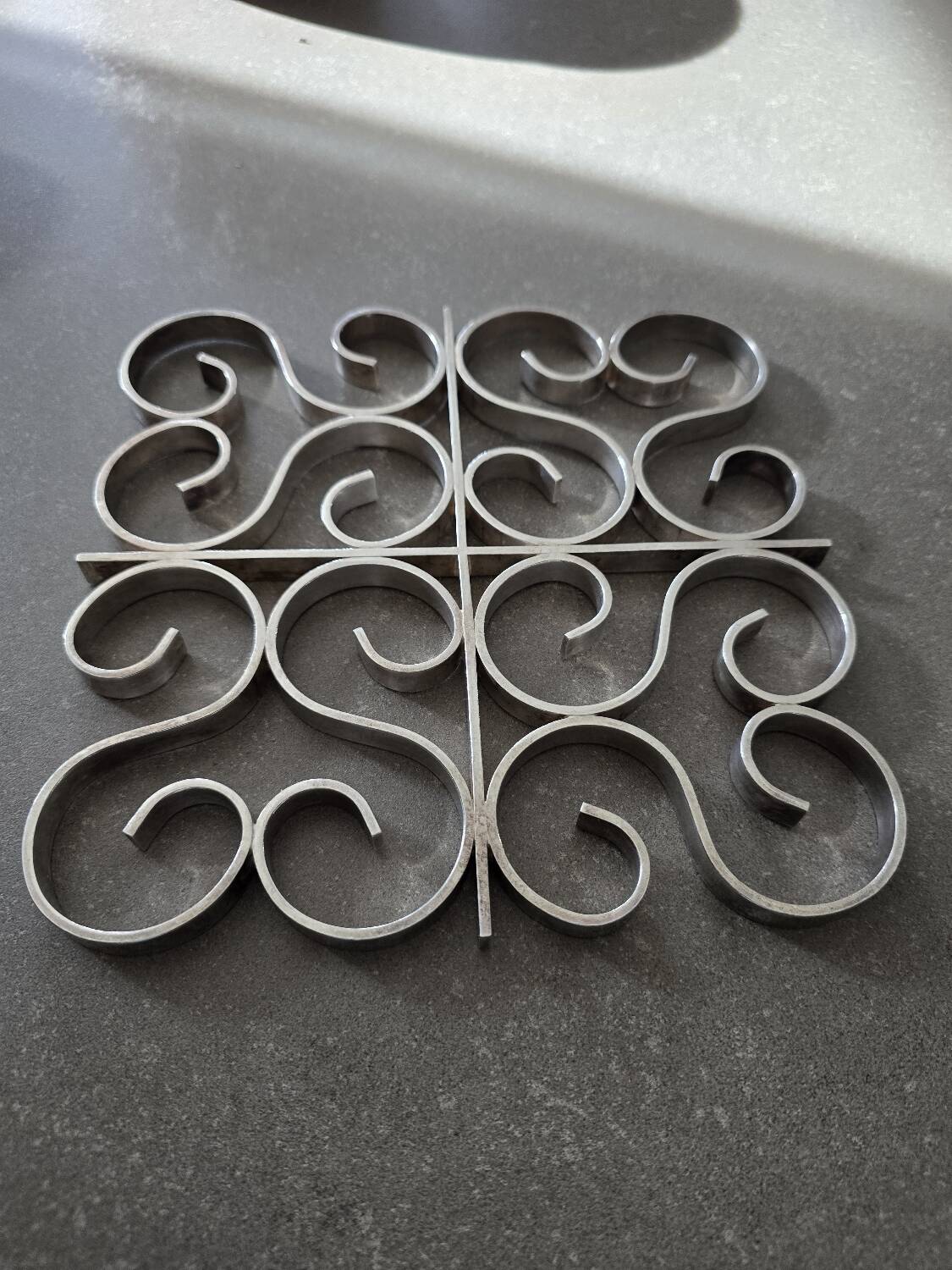 Christofle Gallia model silver-plated metal trivet