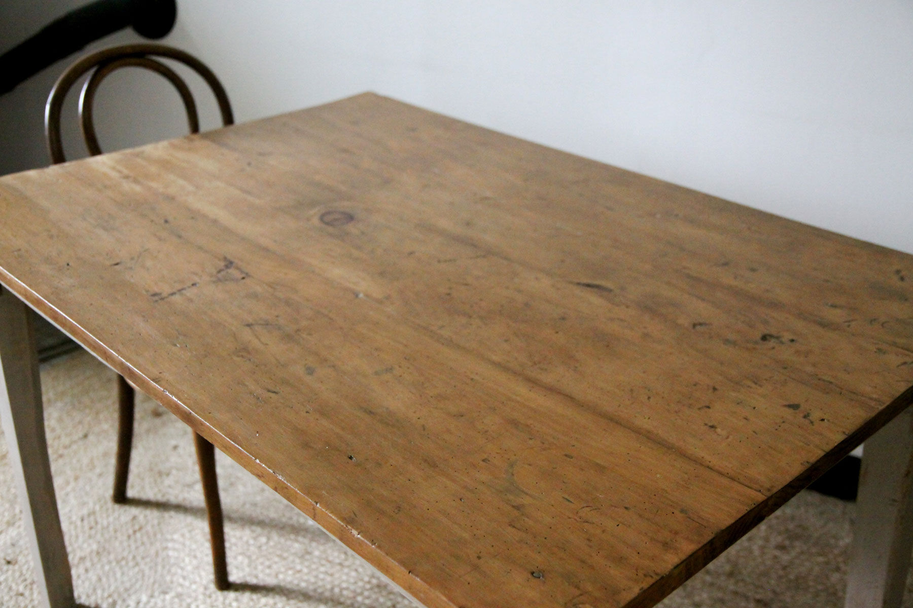 Patinated wooden dining table
