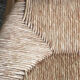 "Paillé" armchair by Charlotte Perriand