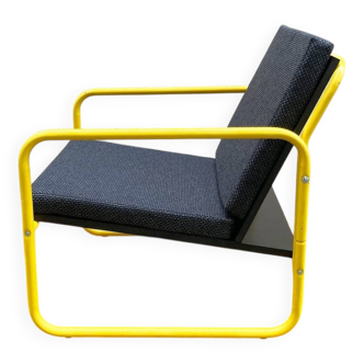 Fauteuil design tubulaire jaune et noir