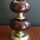 Lamp made of brass and red colored glass