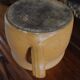 Round terracotta milk jug with handle