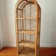 Rattan shelf on legs circa 1960