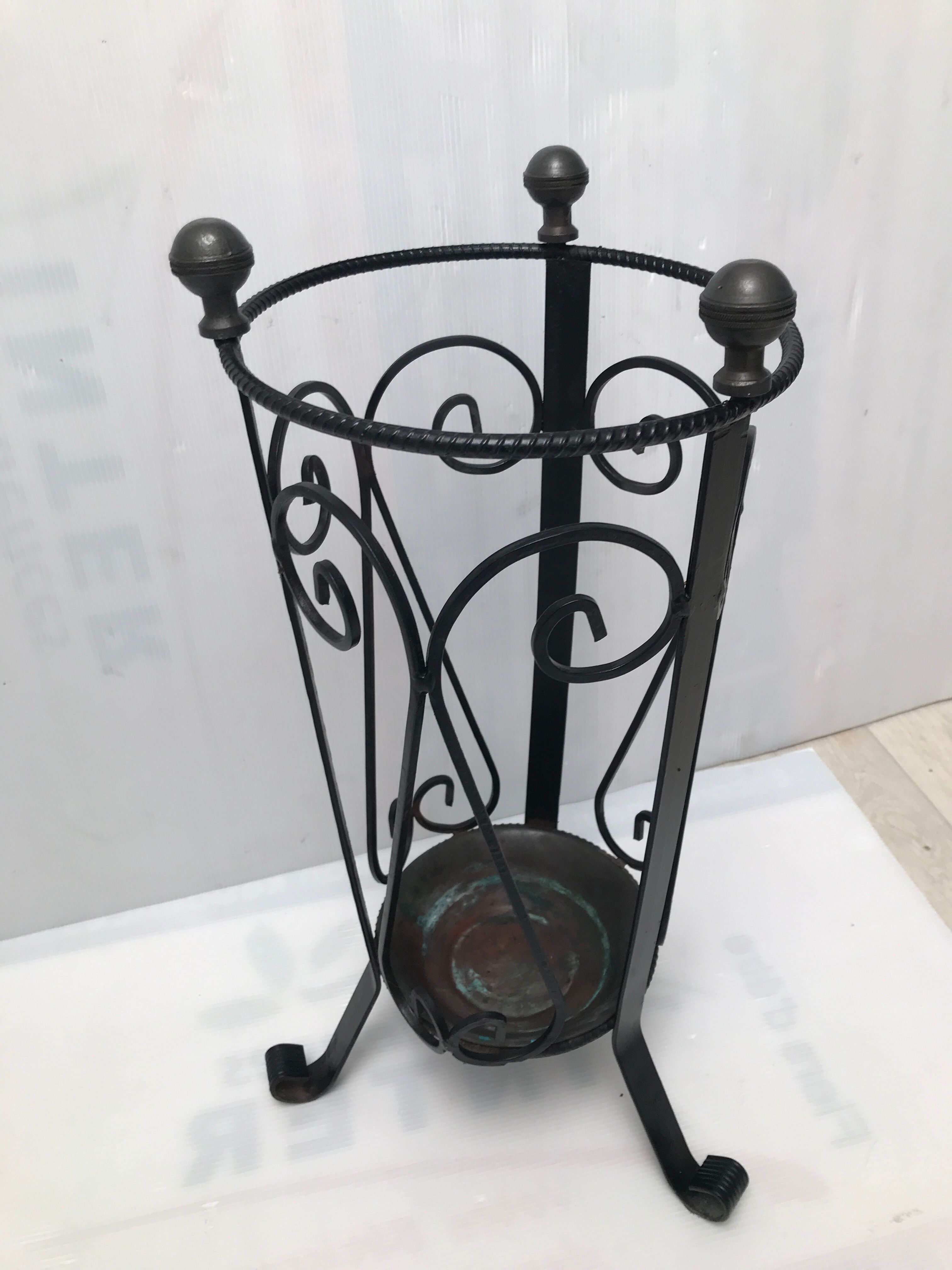 Wrought iron umbrella holder