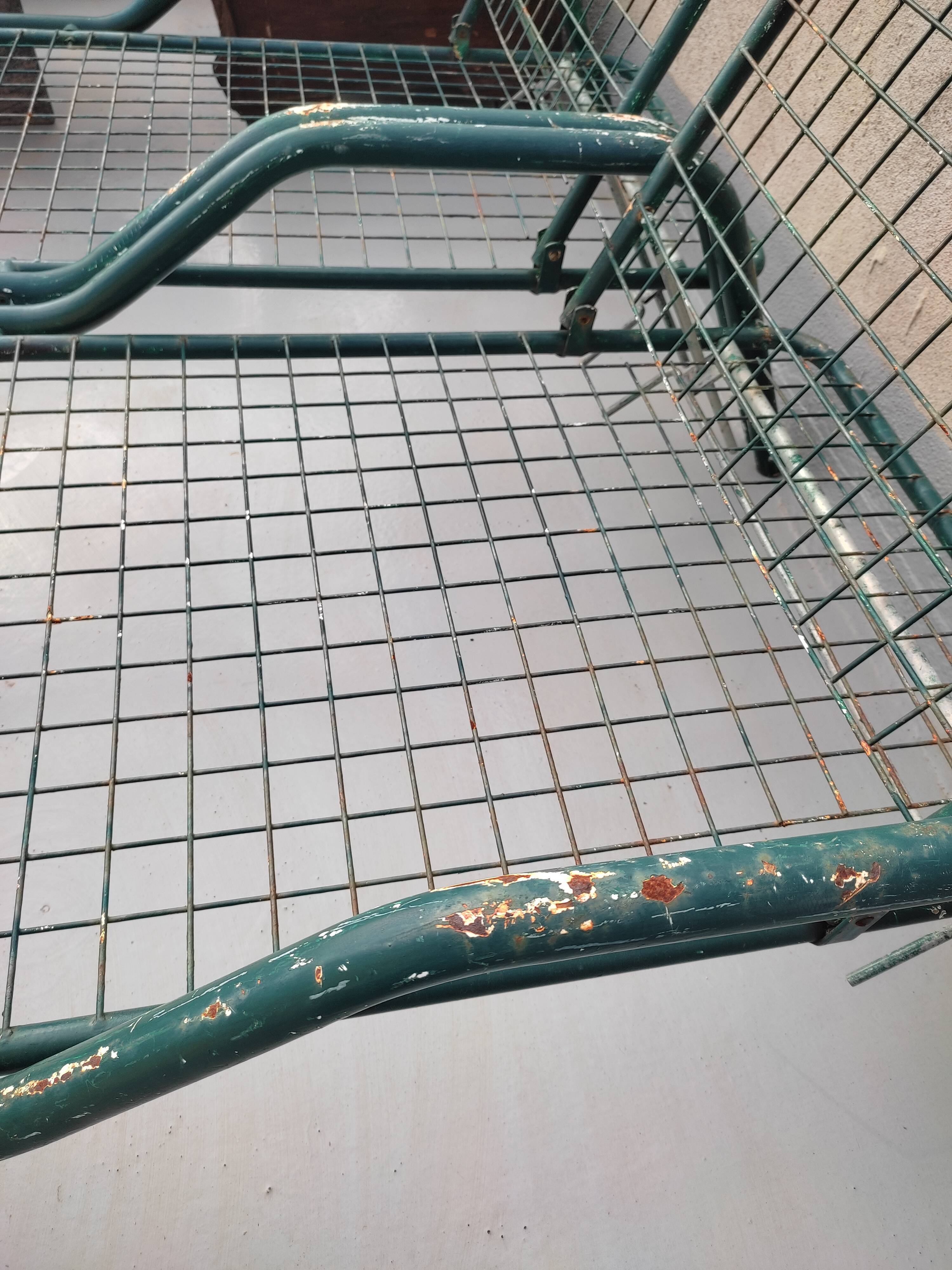 Pair of metal deckchairs