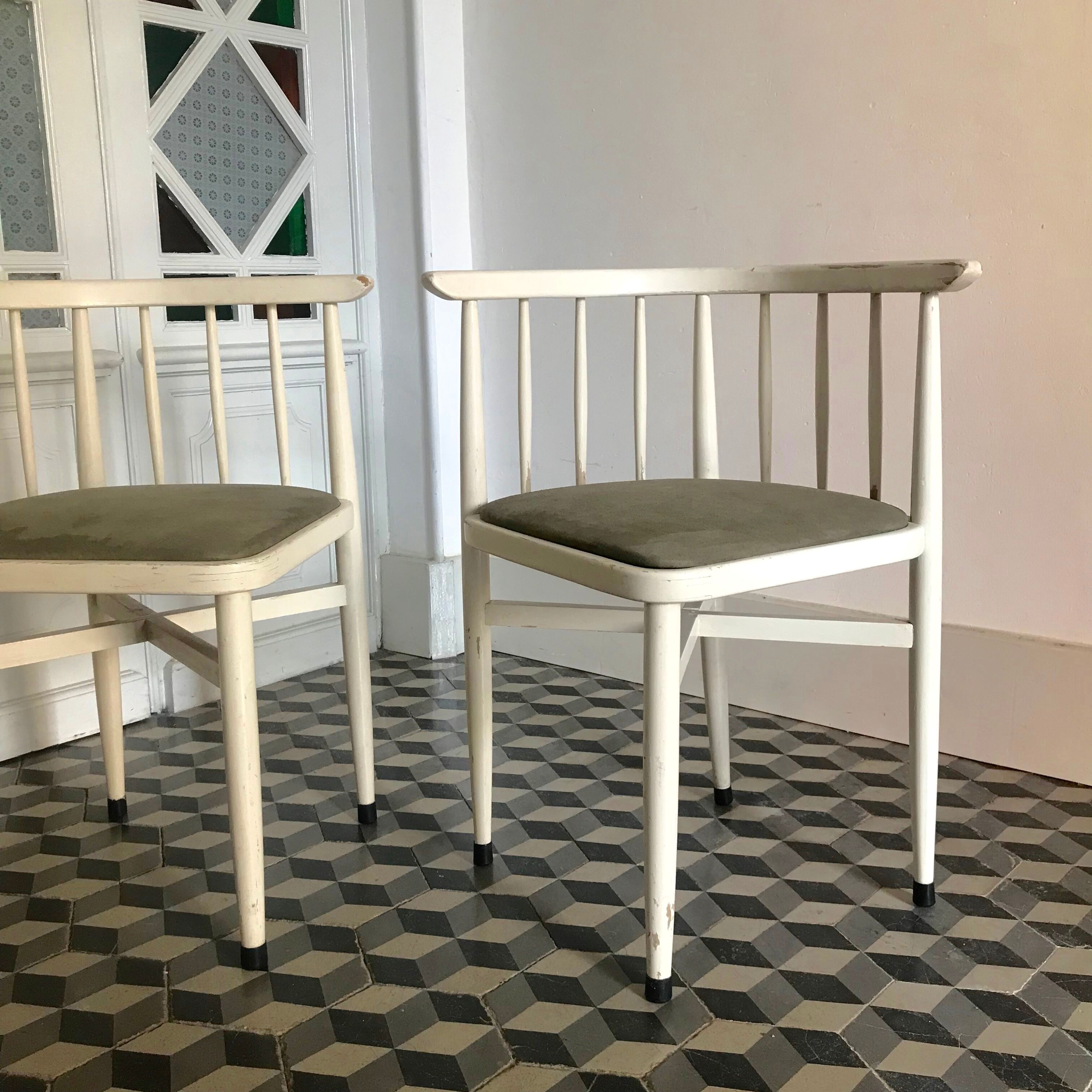 Built-in wooden chairs by Thonet