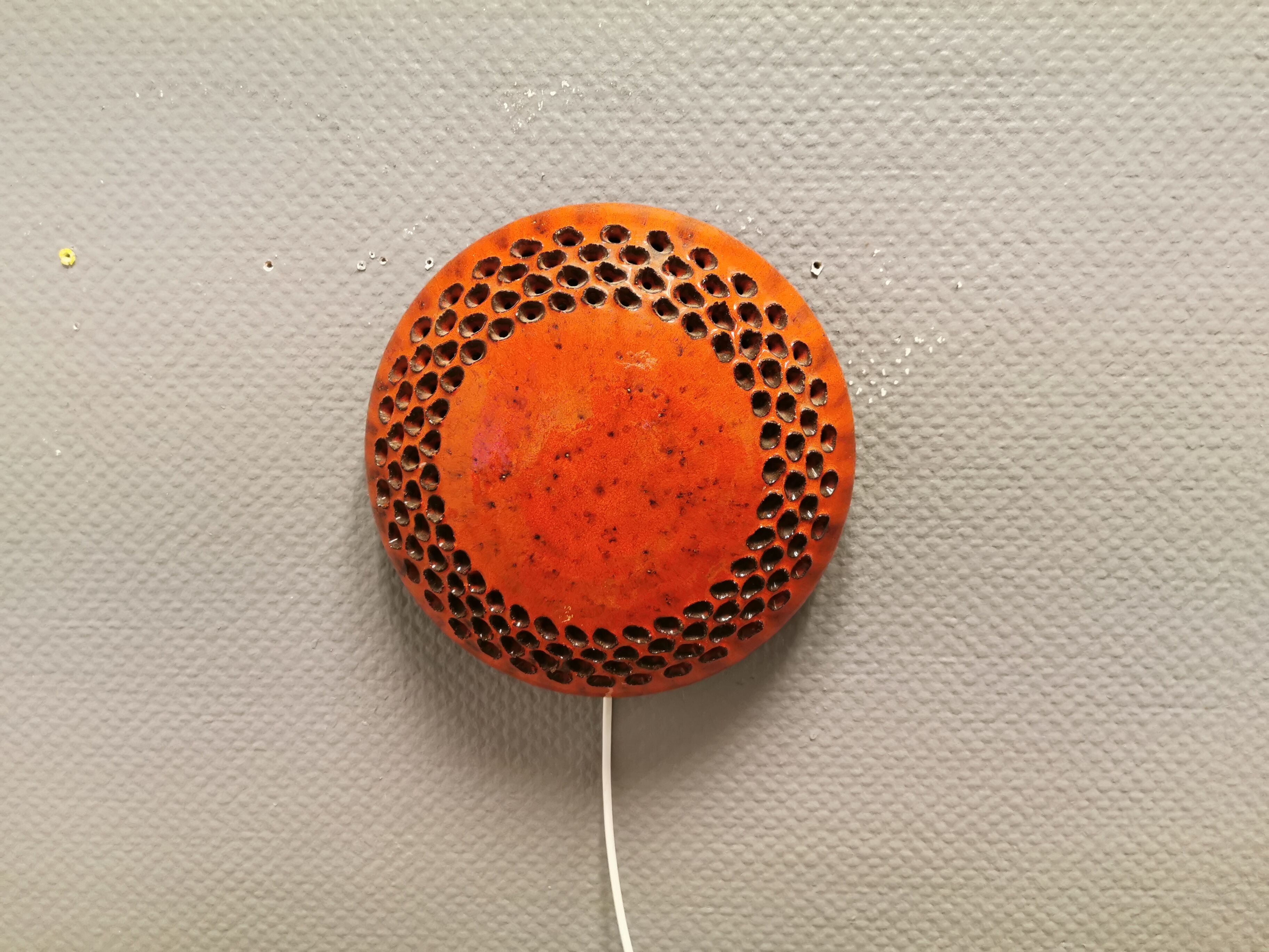 Danish ceramic wall lamp, in nice red glaze. From the 1960s
