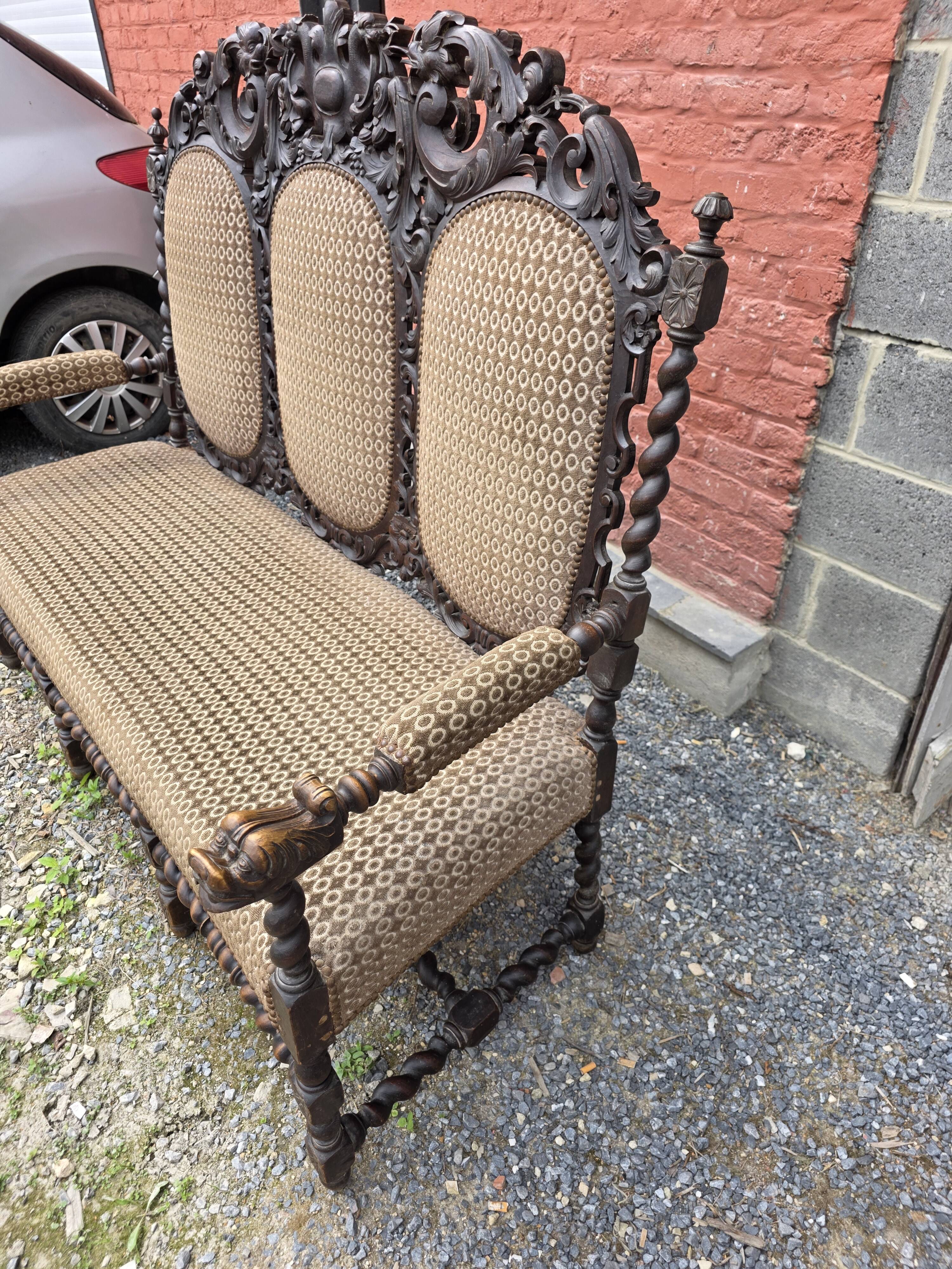 Three-seater armchair in Louis XIII style made of oak from the 19th century.