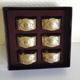 Six rounds of brass towel in their original box 1960  Art Deco