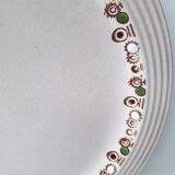 Set of 7 Betty Longwy model plates with floral decoration