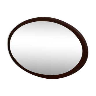 Bevelled mirror with solid oval-shaped wooden frame