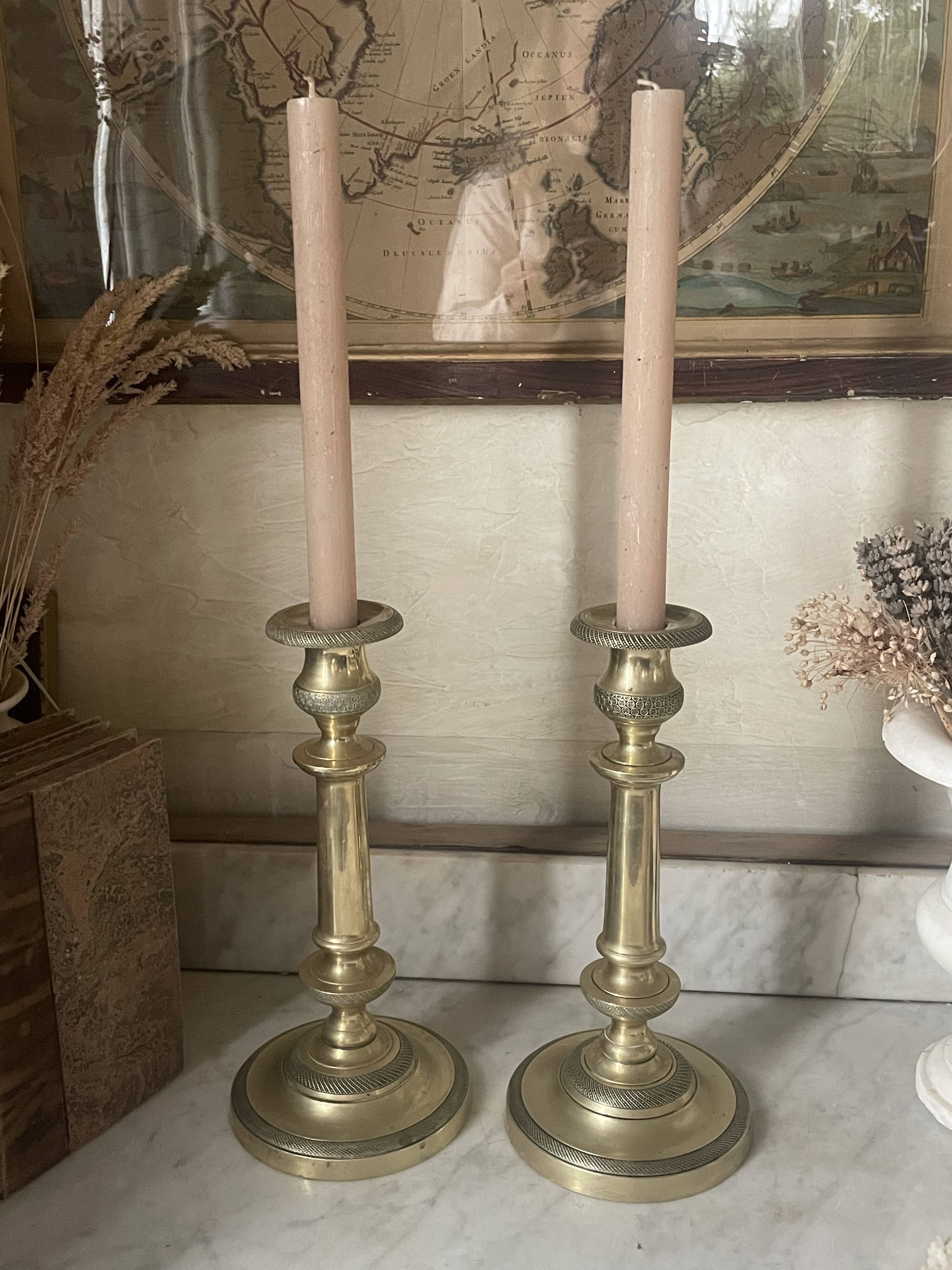 Pair of 19th century guilloche brass candlesticks