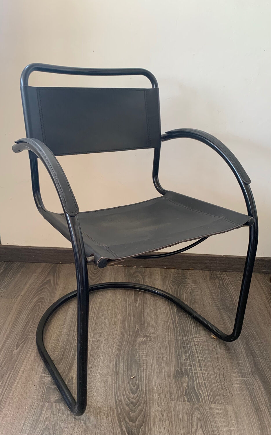 Vintage black sleigh armchair