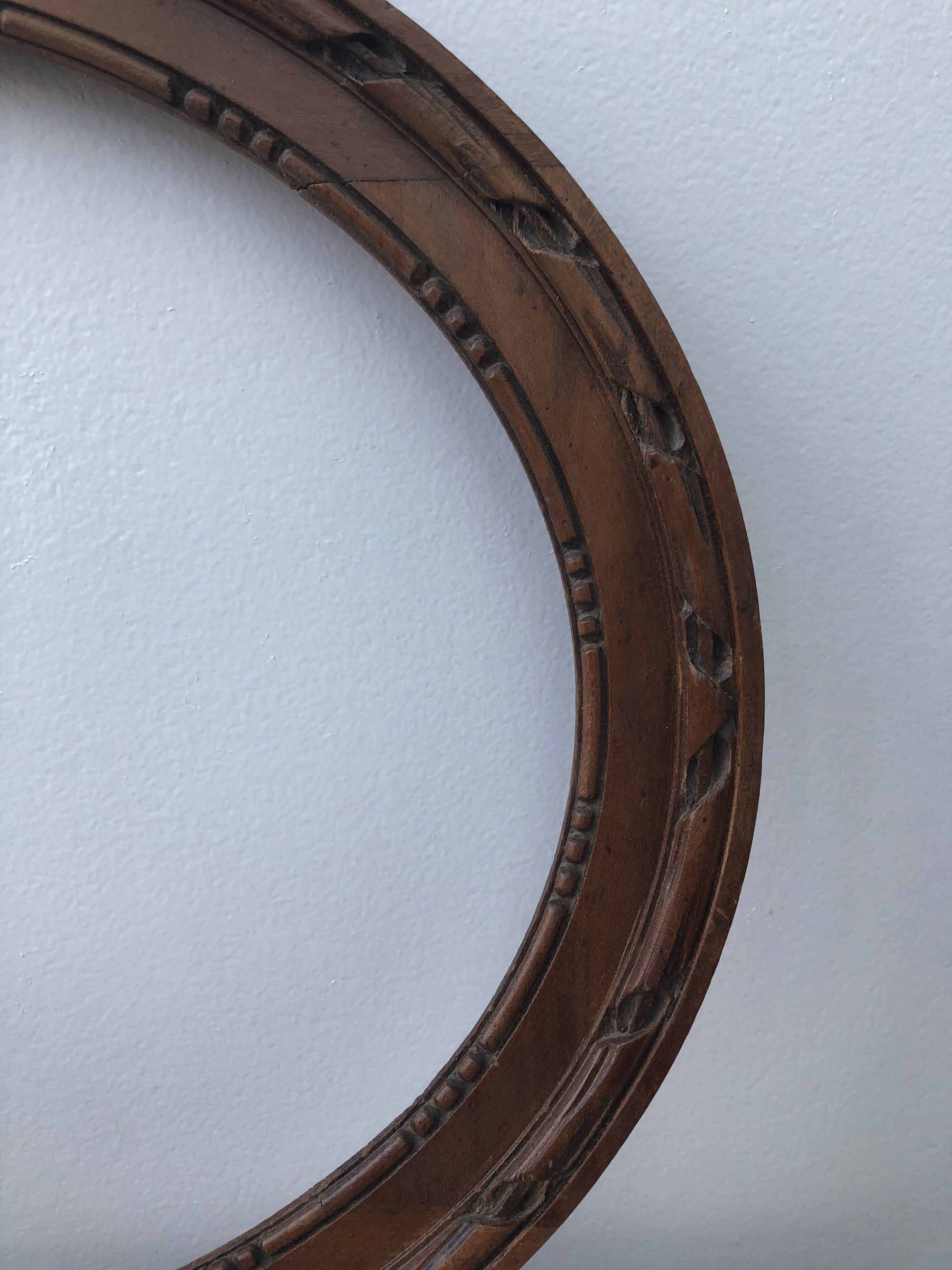 Wooden oval frame