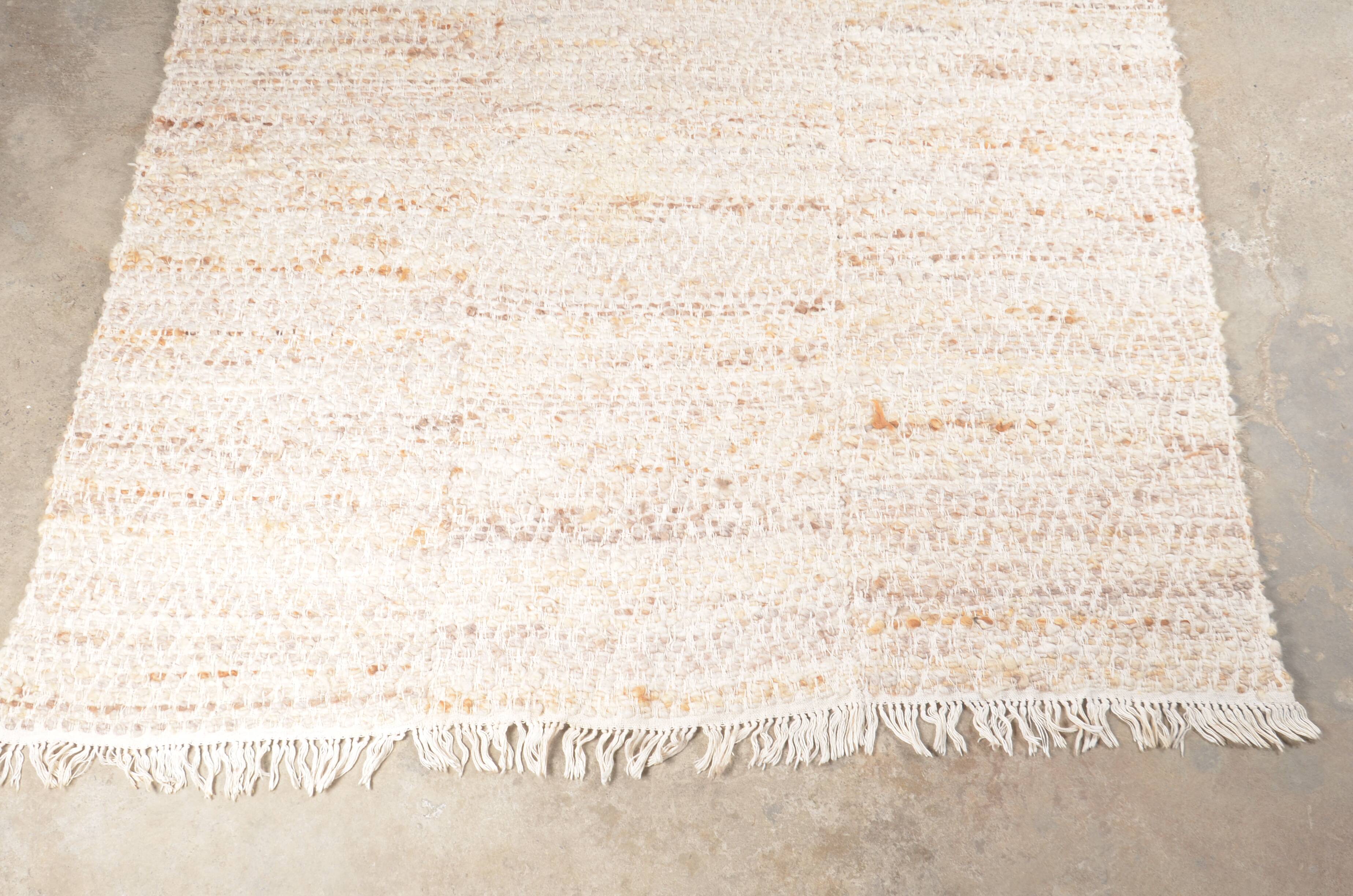 Vintage beige wool rug