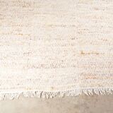 Tapis en laine beige vintage