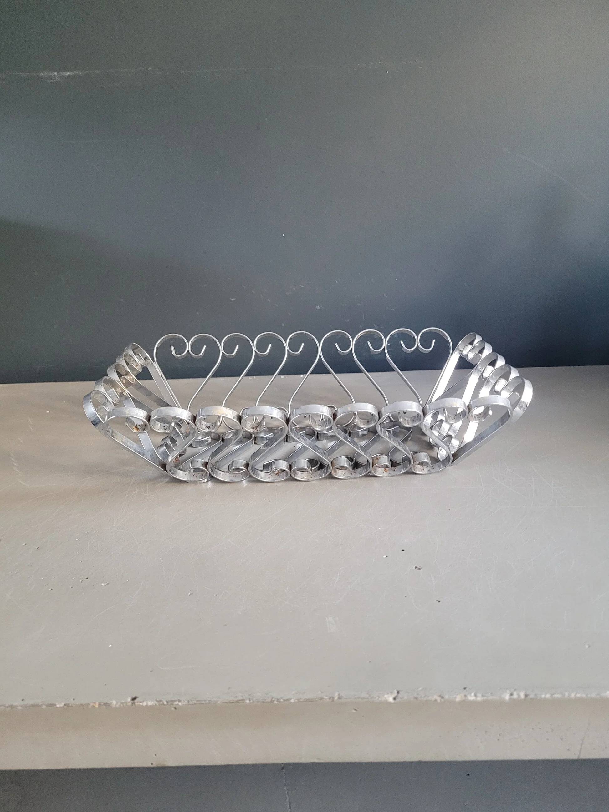 Vintage bread basket in forged chrome-plated metal