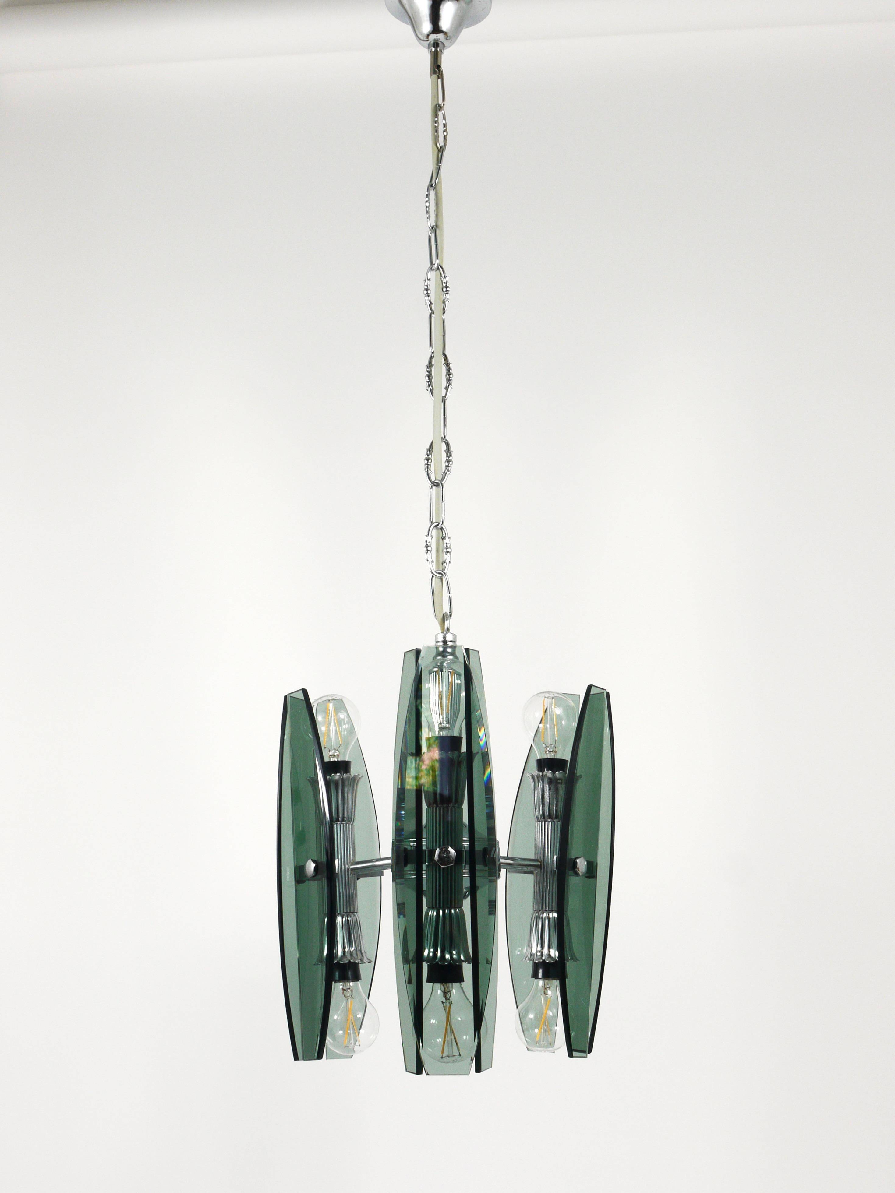 Glass and chrome suspension light in Fontana Arte style by Veca Murano, Italy.