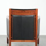 Black leather and wooden Art Deco design armchair