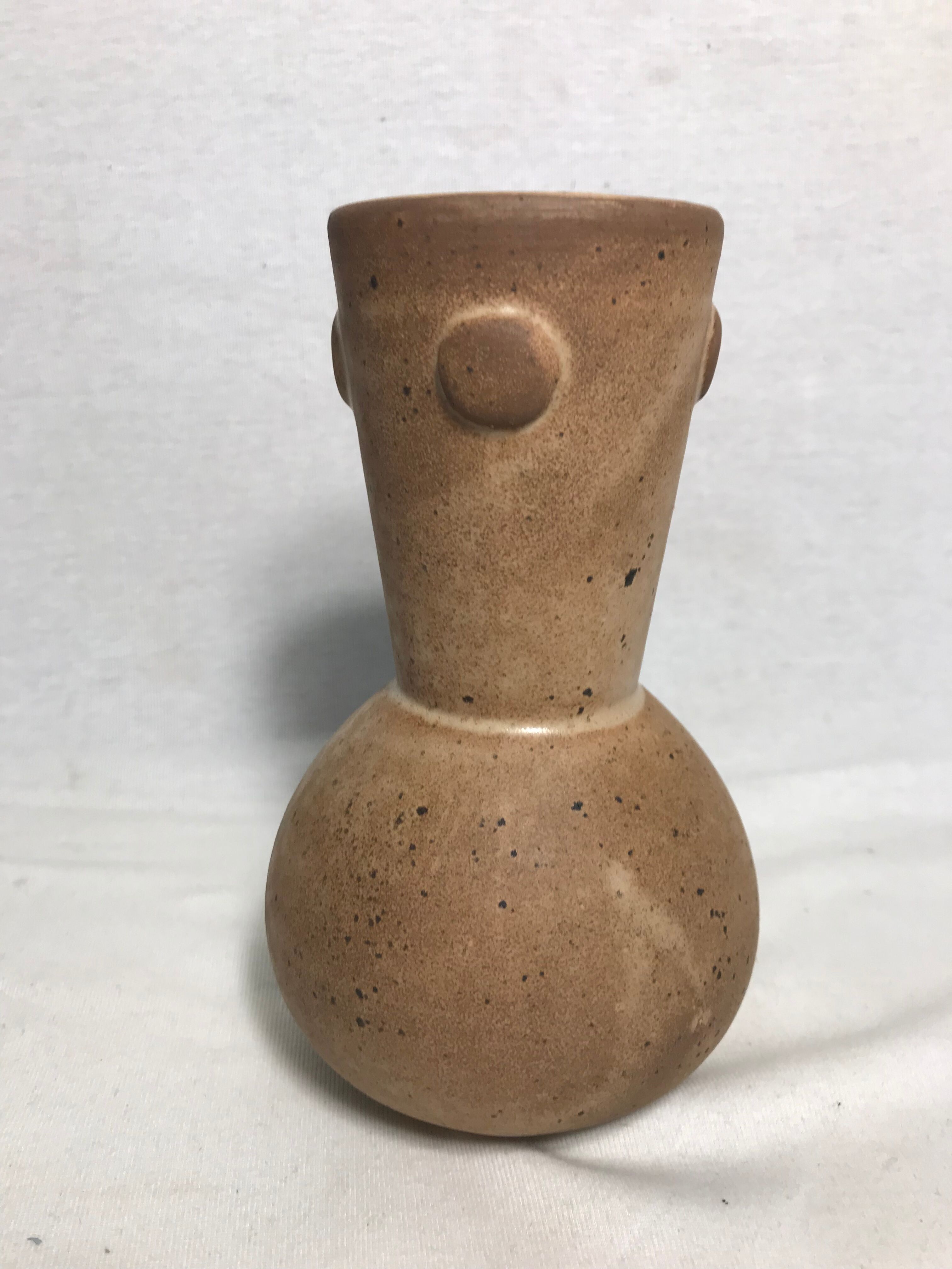 Former brown ceramic vase