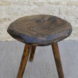 Tripod stool made of carved solid wood, handcrafted, around 1950.