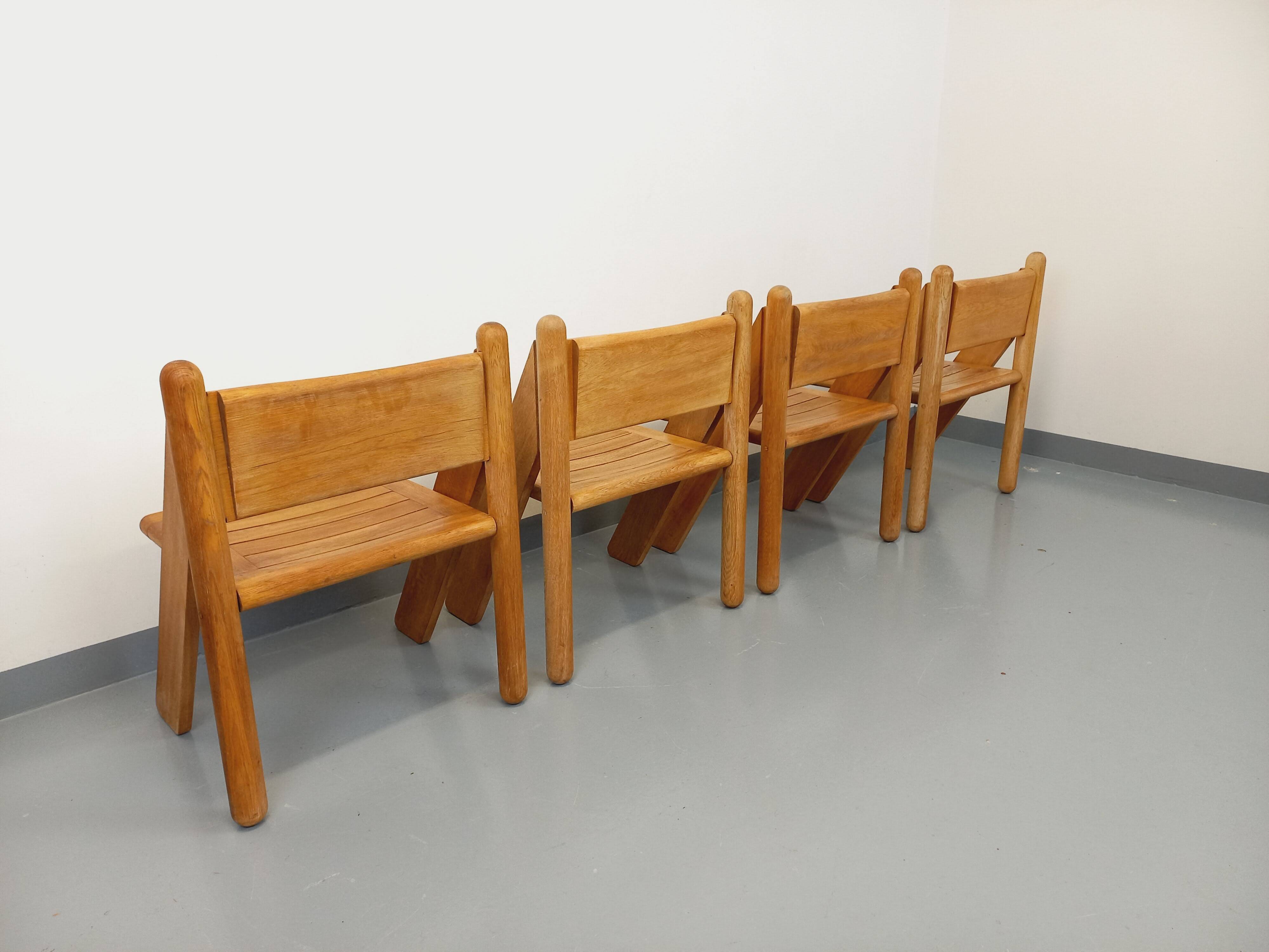 Set of 4 vintage brutalist chairs in solid oak from the 1960s.
