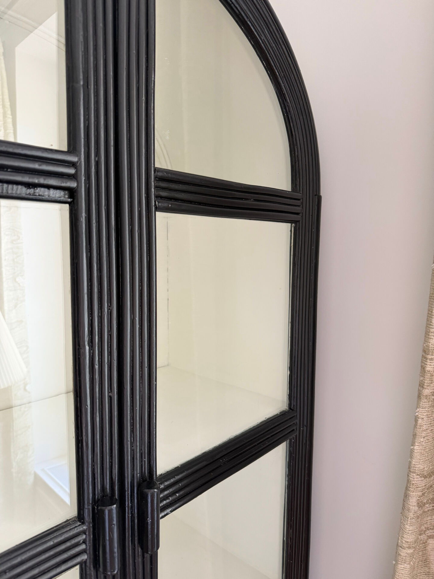 Black woven wood display cabinet