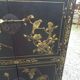 Lacquered wooden Chinese cabinet