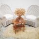 Pair of white rattan armchairs