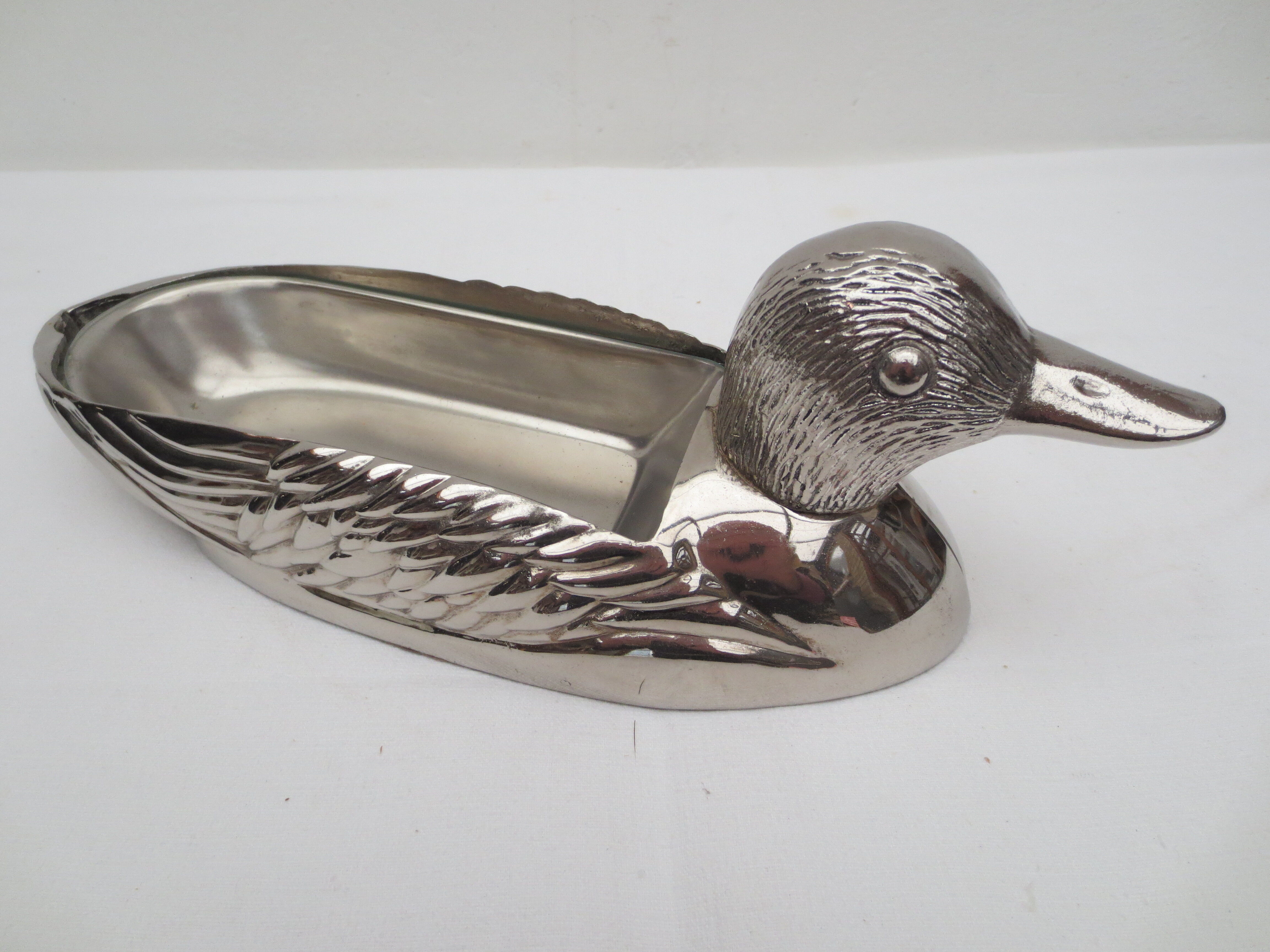 Foie gras dish in silver metal, duck décor