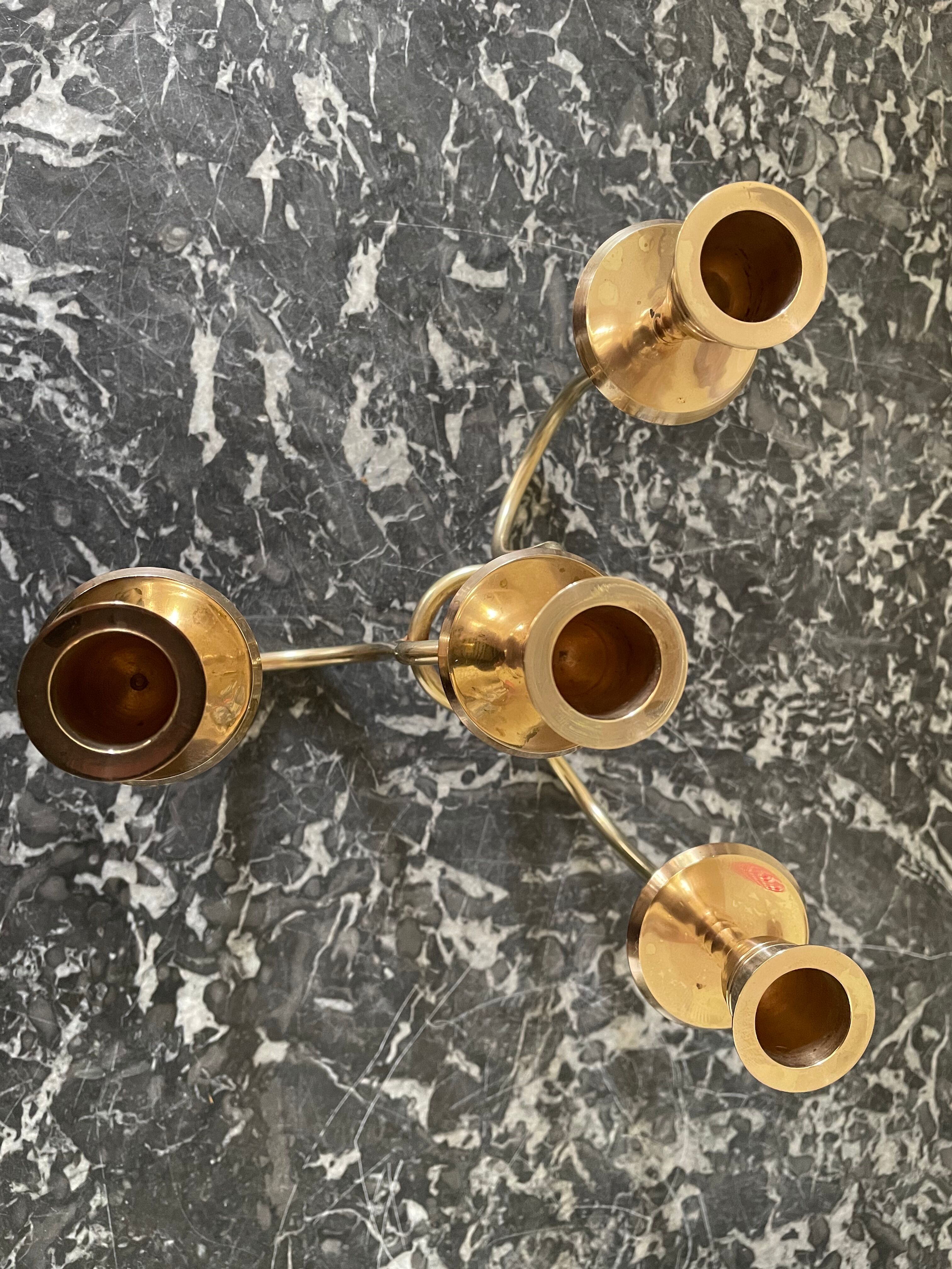 Golden brass candle holder