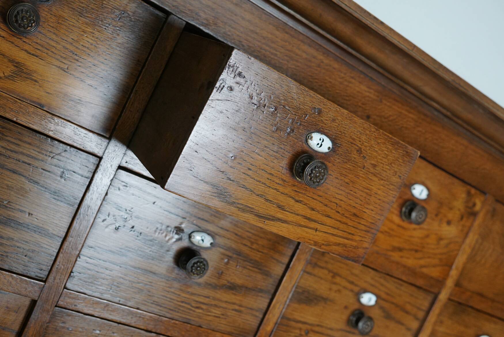 Large dutch oak apothecary cabinet / barber cabinet with enamel shields, 1900s