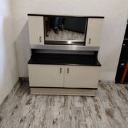 Bar cabinet / entrance furniture with a vintage 1970s mirror.