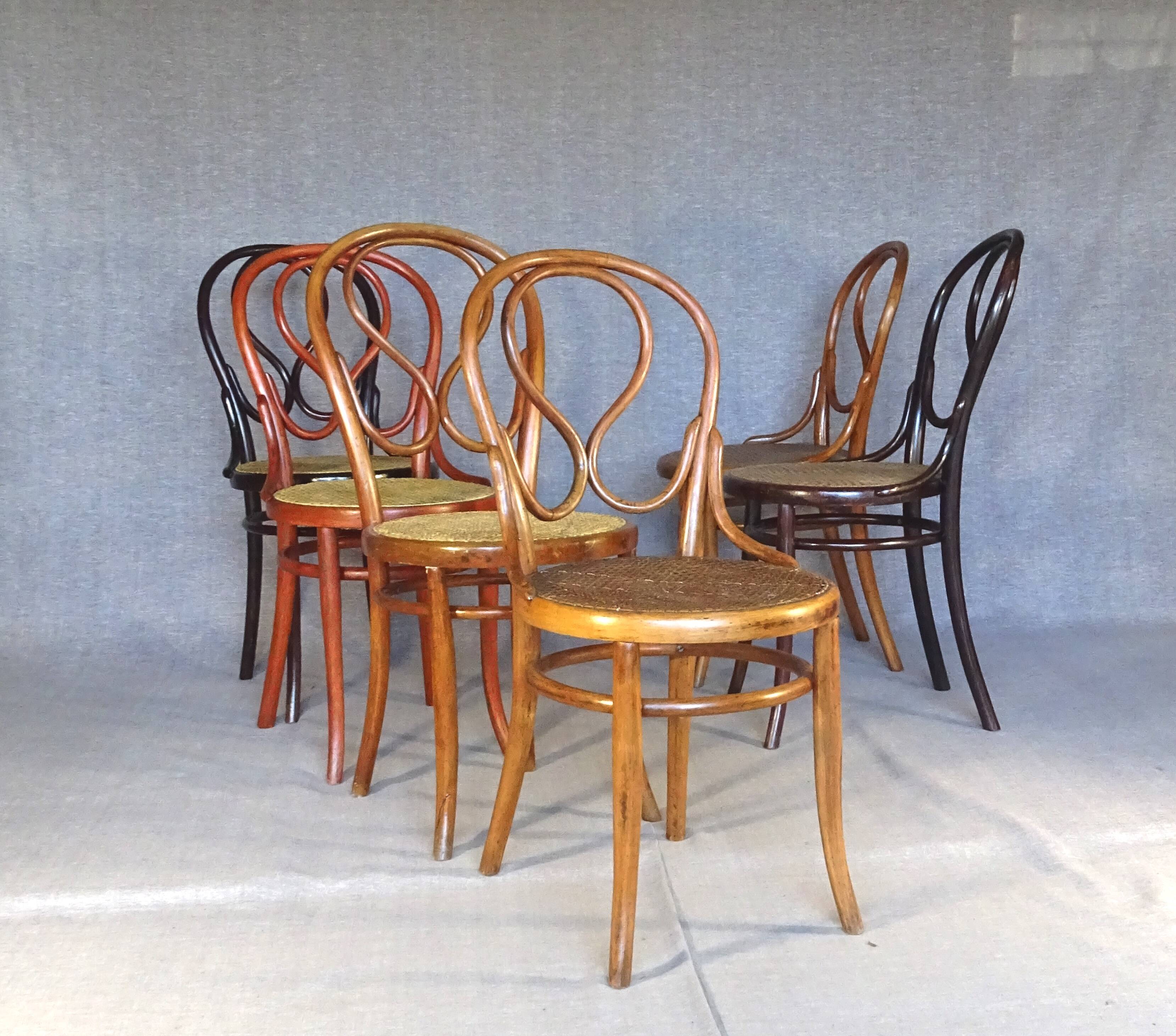 Set of 6 chairs no. 20 known as "omega" caned, including 3 thonet.